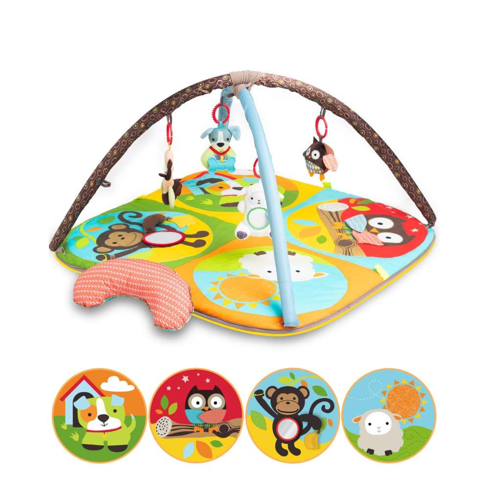TinyBloom baby play gym with four removable sensory toys above a padded activity mat